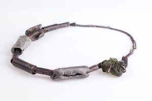 Aluminum (casted), Shibuici, Moldovite glass, readymade Silver chain (oxidized), a bit of Gold 18kt